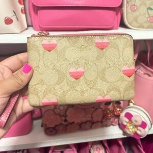 Coach Corner Zip Wristlet In Signature Canvas With Stripe Heart Print Pink Khaki